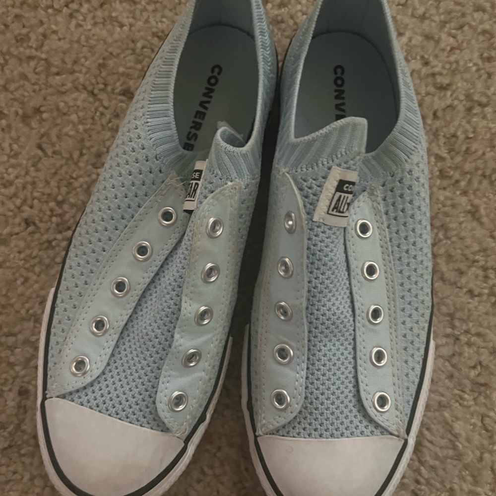 Light blue converse shoes no laces but only worn once